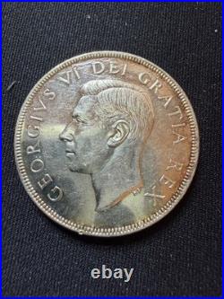 1952 mint Canadian Silver Dollar Coin
