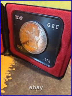 1973 Canada RCMP Centennial Proof Dollar Insane Rainbow Toned Gem