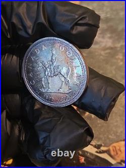 1973 Canada RCMP Centennial Proof Dollar Insane Rainbow Toned Gem