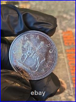 1973 Canada RCMP Centennial Proof Dollar Insane Rainbow Toned Gem