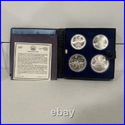 1975 Canada Montreal Olympic Games. 925 Silver Four Coin Set in RCM OGP