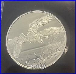 2014 $50 Canadian silver coin depicting snowy owl uncirculated