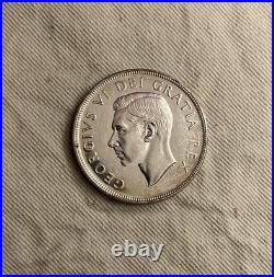 Canada $1 1948 UNC+. Key Date