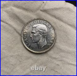 Canada $1 1948 UNC+. Key Date