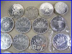 Canada Lot of 21 Silver Coins, 13 Silver $1 & 8 Halves, diff dates 1939 to 1971
