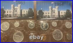 Canadian mint 1963 and 1964 coins with the 1964 $1 commemorating Charlottetown