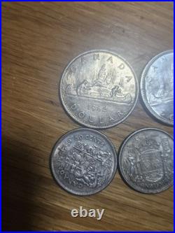 Lot of canadian 80% silver dollars and half dollars All nice coins