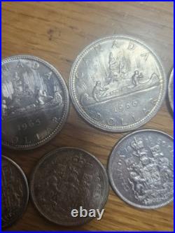Lot of canadian 80% silver dollars and half dollars All nice coins