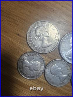 Lot of canadian 80% silver dollars and half dollars All nice coins