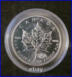 RCM 1 oz Silver bullion (9999) Maple Leaf round with Fireworks privy mark